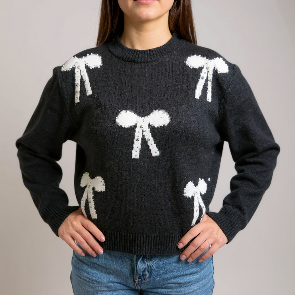 Eleganter schwarzer Damen-Strickpullover mit weissen Schleifen – femininer und zugleich klassischer Look für Casual und Business-Casual Outfits. Exklusiv bei CasinoFashion in Winterthur.