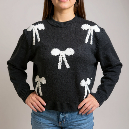 Eleganter schwarzer Damen-Strickpullover mit weissen Schleifen – femininer und zugleich klassischer Look für Casual und Business-Casual Outfits. Exklusiv bei CasinoFashion in Winterthur.