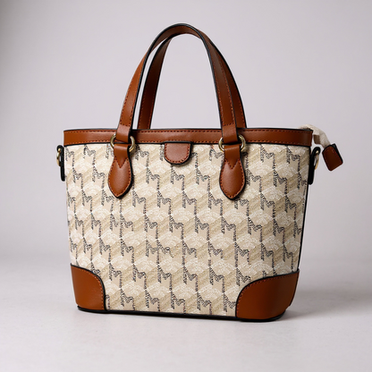 Elegante Designer-inspirierte Damen-Handtasche mit braunen Lederdetails und edlem Print – geräumige Tote Bag für Alltag, Arbeit oder Shopping. Hochwertiger Look, exklusiv bei CasinoFashion in Winterthur.