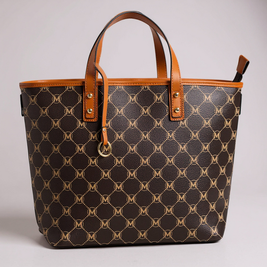 Luxuriöse Damen-Tote-Bag in Dunkelbraun mit goldbraunem Monogram-Print und edlen Ledergriffen – geräumige Handtasche für Alltag, Arbeit oder Shopping. Exklusiv bei CasinoFashion in Winterthur.